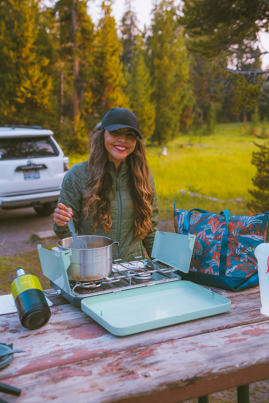 cooking up a meal while camping